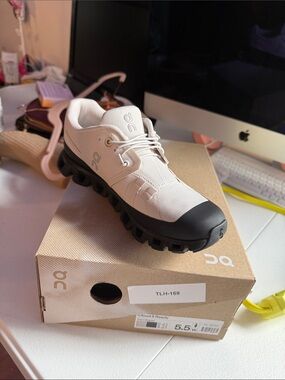 On Running White and Black Casual Trainer